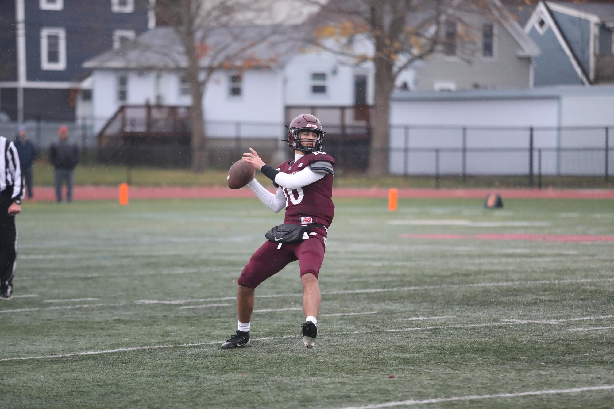 Quarterback Camryn Rodolosi prepares to throw the ball up the field. 
