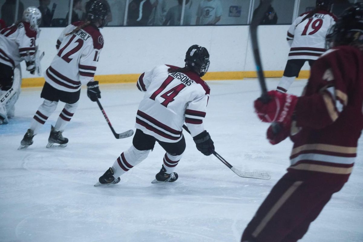 Captain Elliana Parsons skates down the ice in a scrimmage earlier this season.