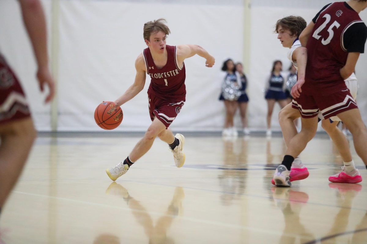 Senior guard Alex Laine makes the push for a basket.