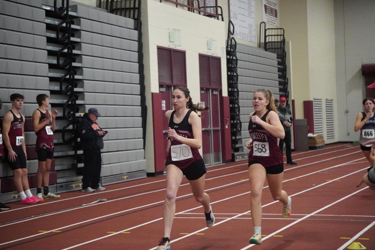 Hope Castellucci and Meadow Anderson head towards the finish line in the 600 meter race.