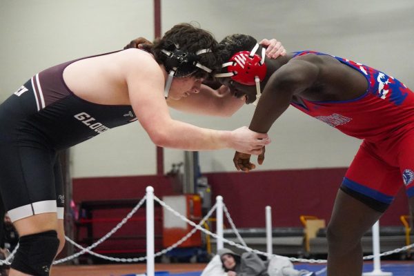 Sophomore Max Thomas takes on Tewksbury's Manuel Mengata in the Finals. 