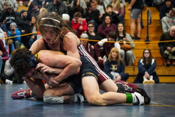 Jayden Chadwick wrestles in Consolation on Saturday against his Rockland opponent.