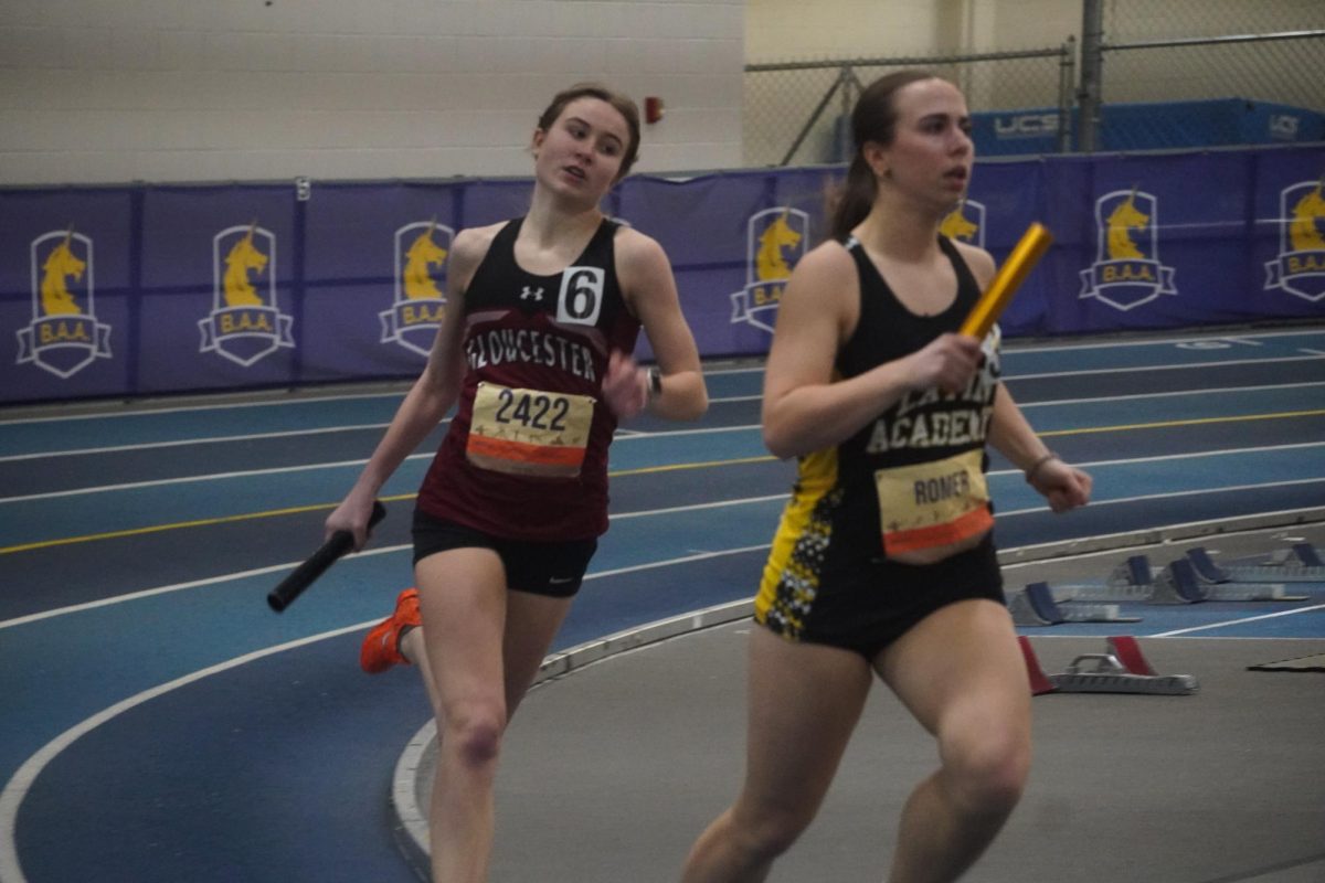Grace Castellucci chases down an opponent on the curve.