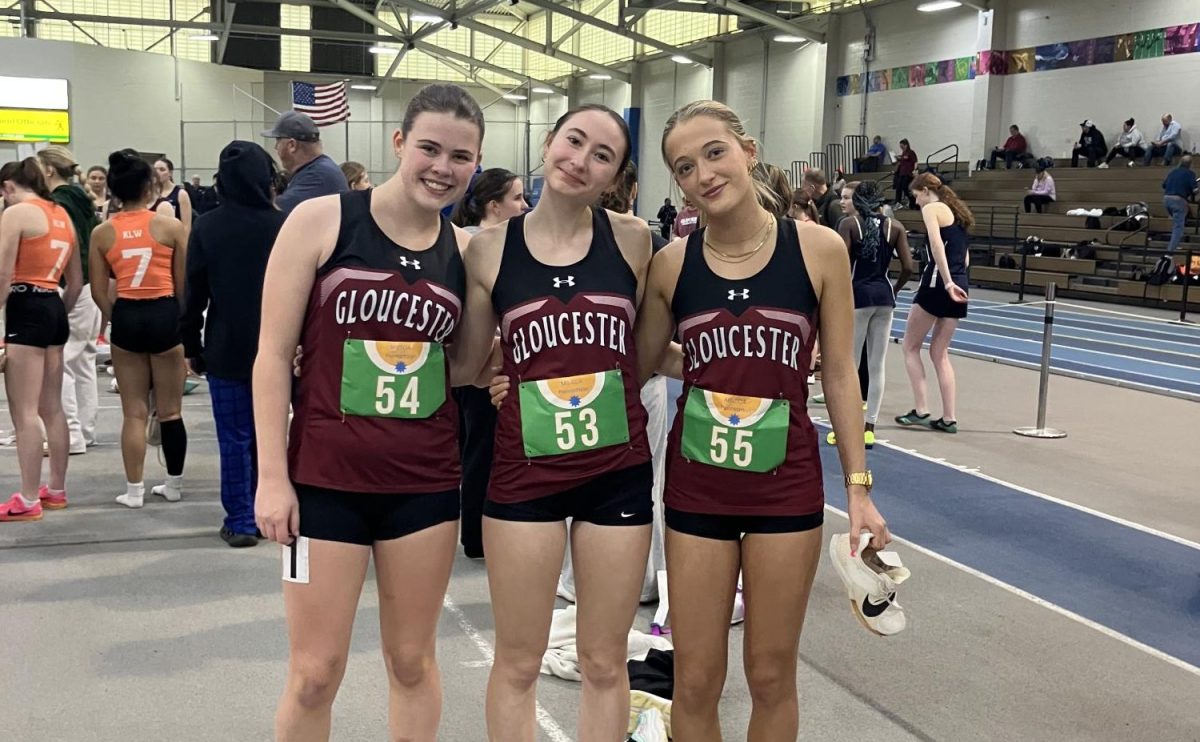 Caitie Dewan, Hope Castellucci, and Aili Spencer pose before their competition.