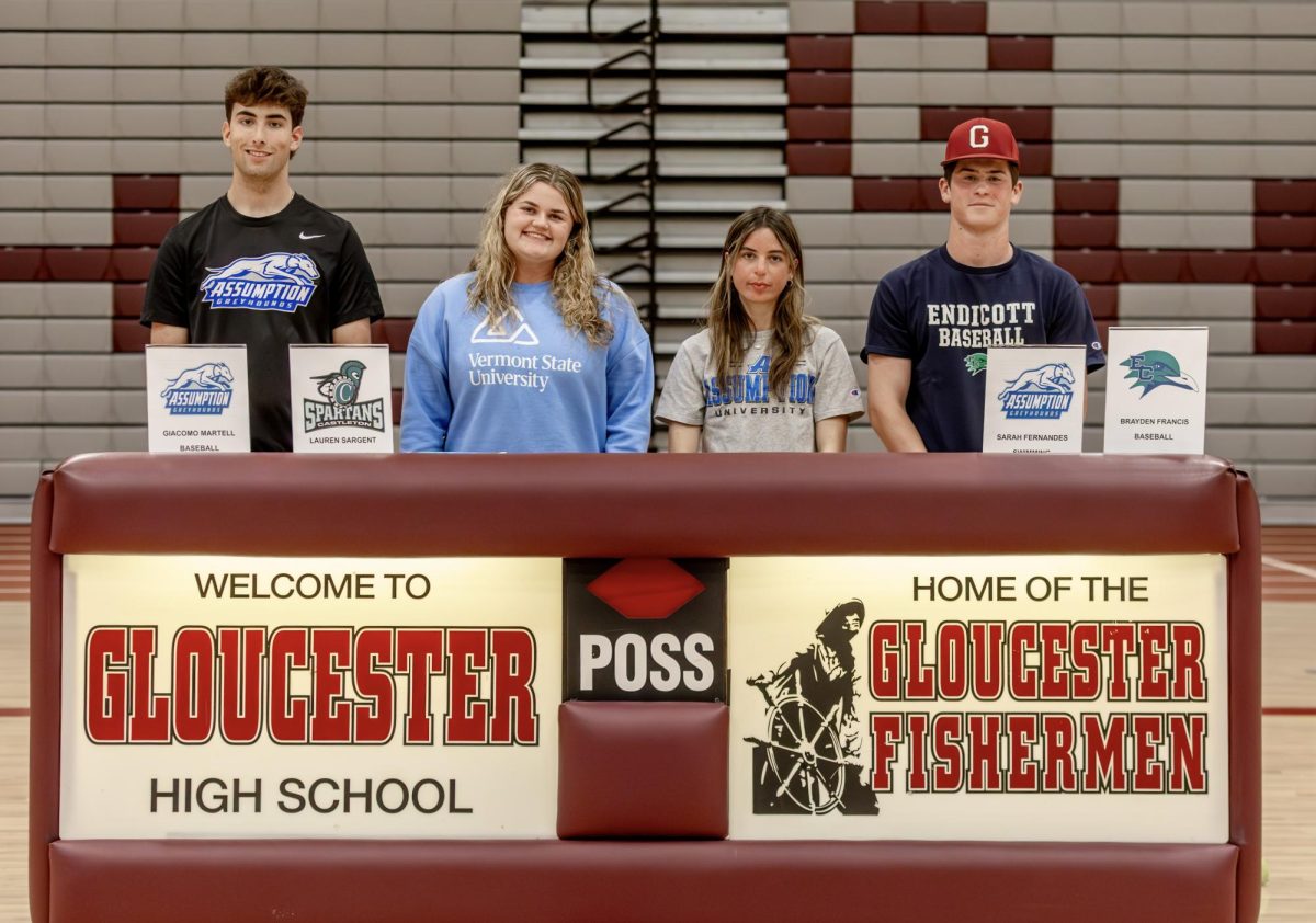 (From left to right) Giacomo Martell (Assumption Baseball), Lauren Sargent (Castleton University), Sarah Fernandes (Assumption Swim and Dive), and Brayden Francis (Endicott Baseball) pose together during signing day. 

Photo used with permission of Dawn Enos and GHS Fishermen Athletics