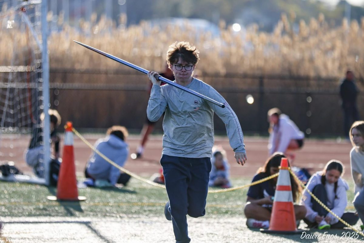 Dylan Smith prepares to throw the javelin during his flight.