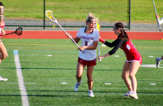 Skye Berry runs downfield during the game in pursuit of the goal.