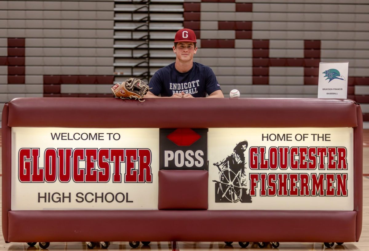 Brayden Francis signs his letter of intent to continue his baseball career at Endicott College. He is one of four GHS athletes from the Class of 2025 to commit to continue their athletic careers in college.
Photo used with permission of Dawn Enos and GHS Fishermen Athletics