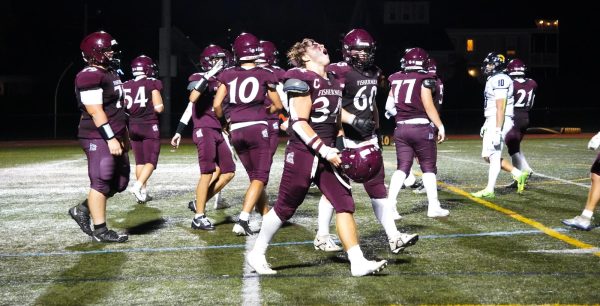 Senior Captain Thomas Cribbs celebrates after QB Camryn Rodolosi scored his second touchdown of the night.