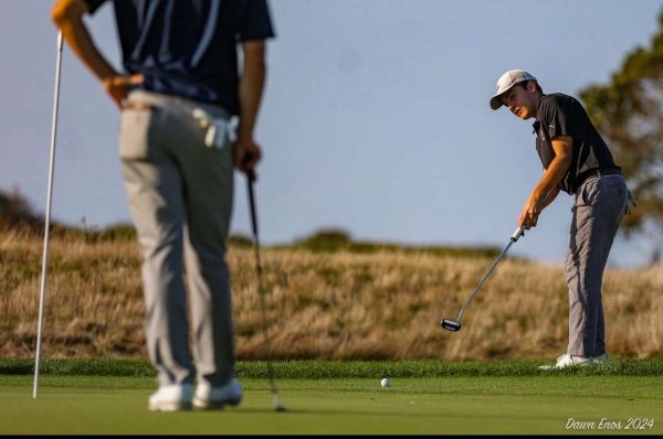 Trevor D'Annolfo focuses on an important putt. [Photo courtesy of Dawn Enos]