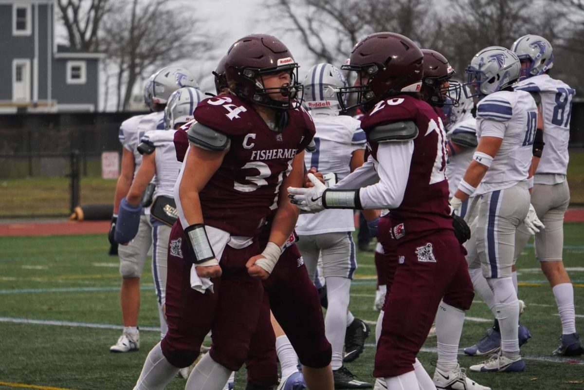 Thomas Cribbs celebrates with his teammates in a game last season. The senior was named a Boston Herald Player of the Week for his performance in the win over Beverly.  