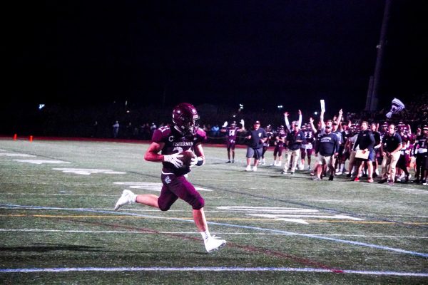 Joe Allen rushes for a touchdown in Gloucester's 34-33 win over Bishop Fenwick.