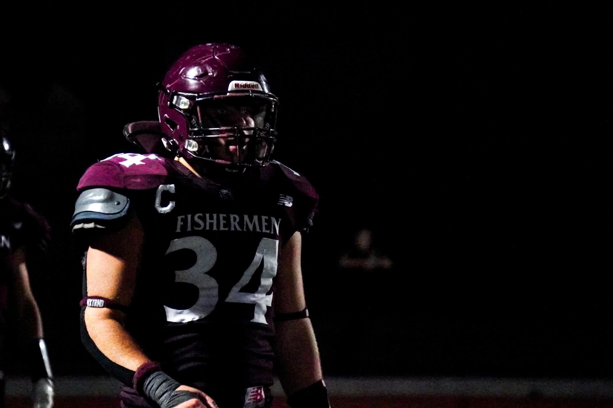 Thomas Cribbs walks down the sideline during a timeout during Friday's game.