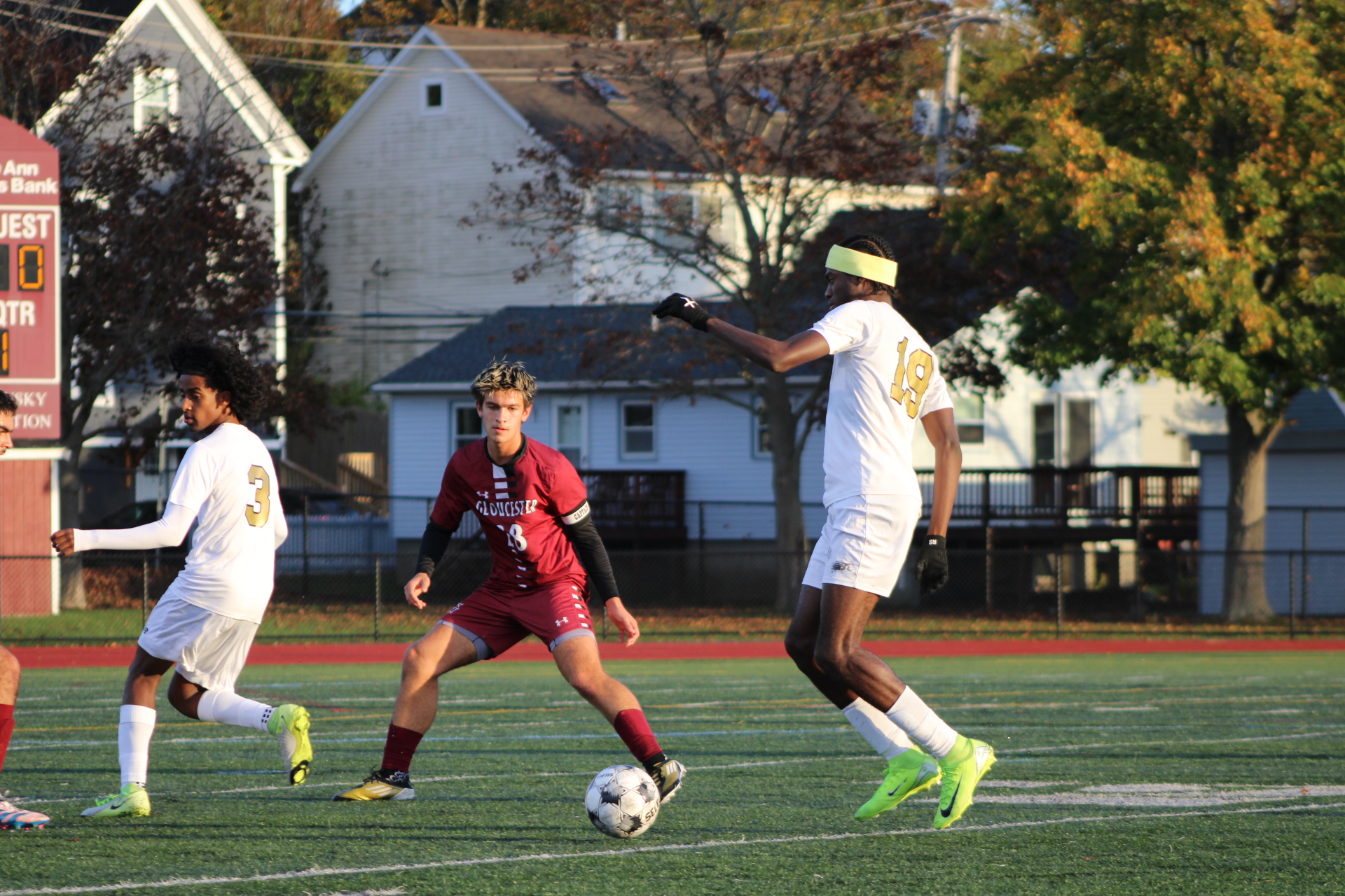 Captain Henry Harrison anticipates a dribble from a Malden player.