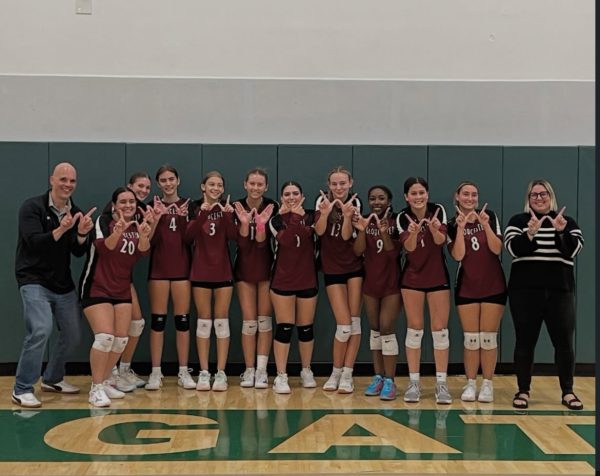 The Volleyball team poses after their win. [Photo courtesy of GHS Volleyball]