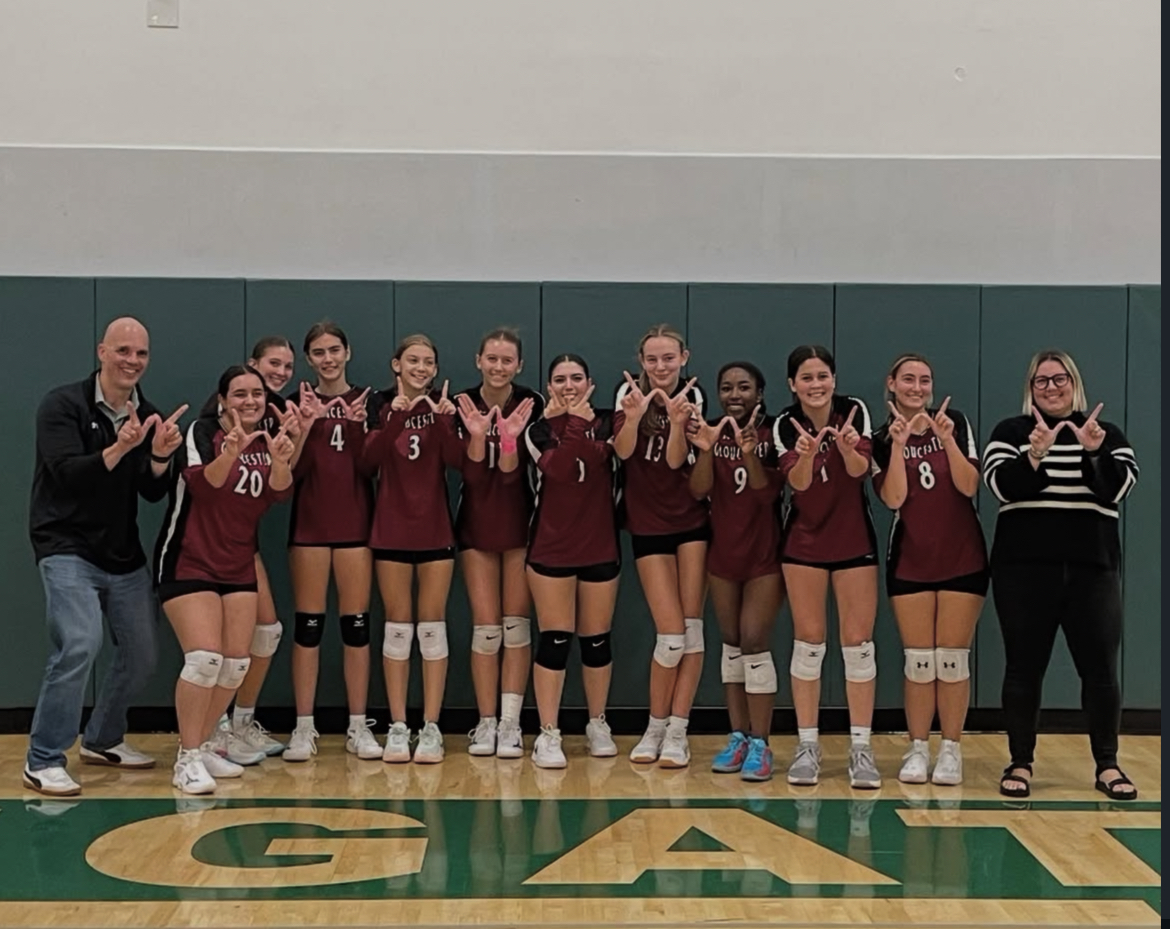 The Volleyball team poses after their win. [Photo courtesy of GHS Volleyball]