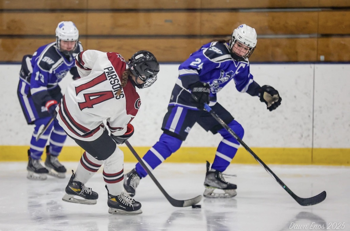 Elliana Parsons skates past a defender in a game last season. [Photo used with permission of Dawn Enos]