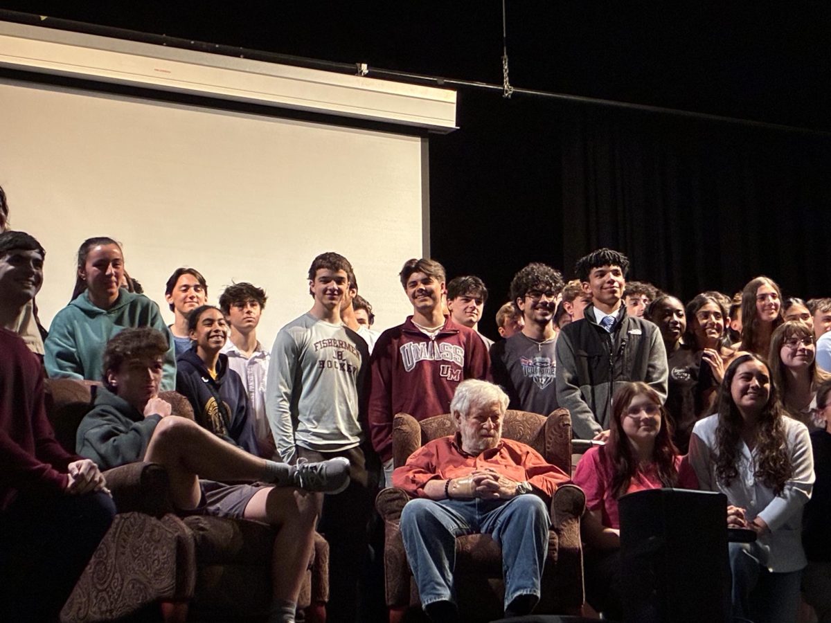 Holocaust survivor Werner Salinger (center) poses with GHS history students.